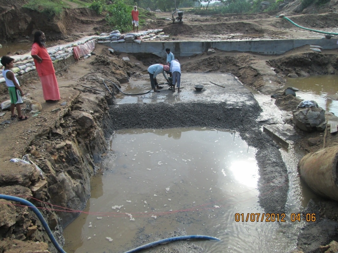 Workers carrying out excavation at the Water Project site in July 2012
