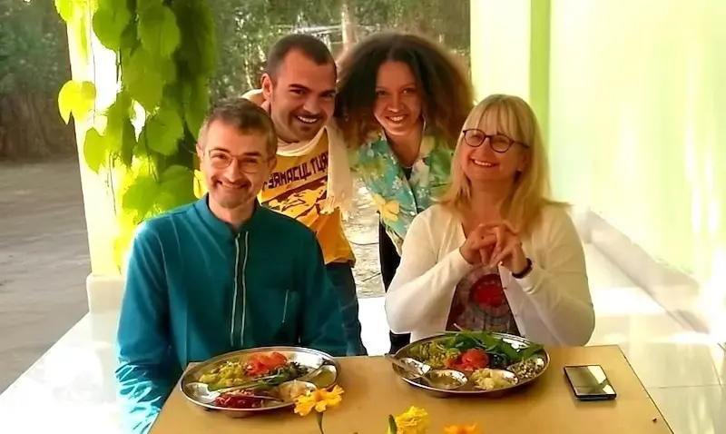 Residential guests enjoying fresh vegetarian food at the treatment centre