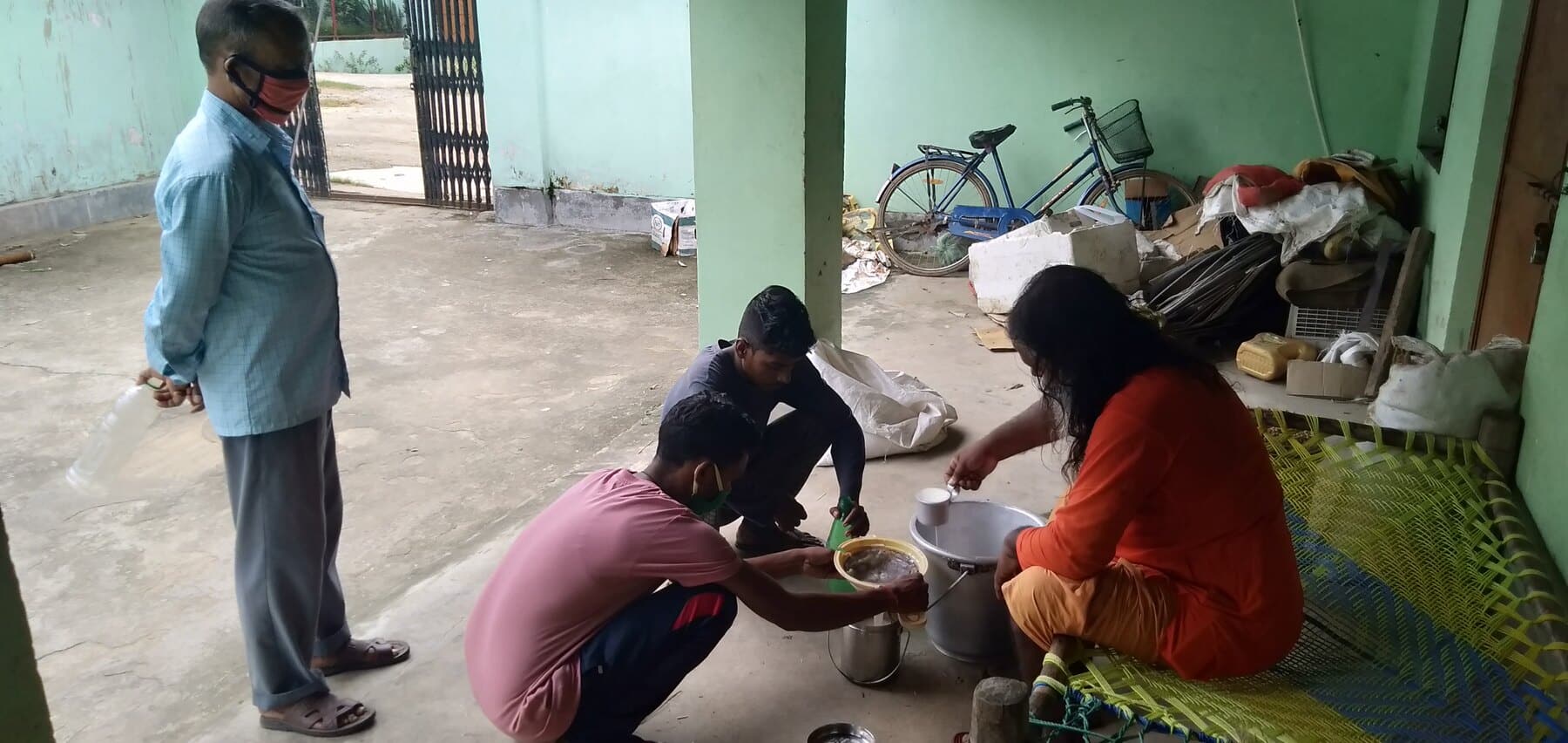 The Ánanda Nagar Dairy Farm team working together during the daily routine