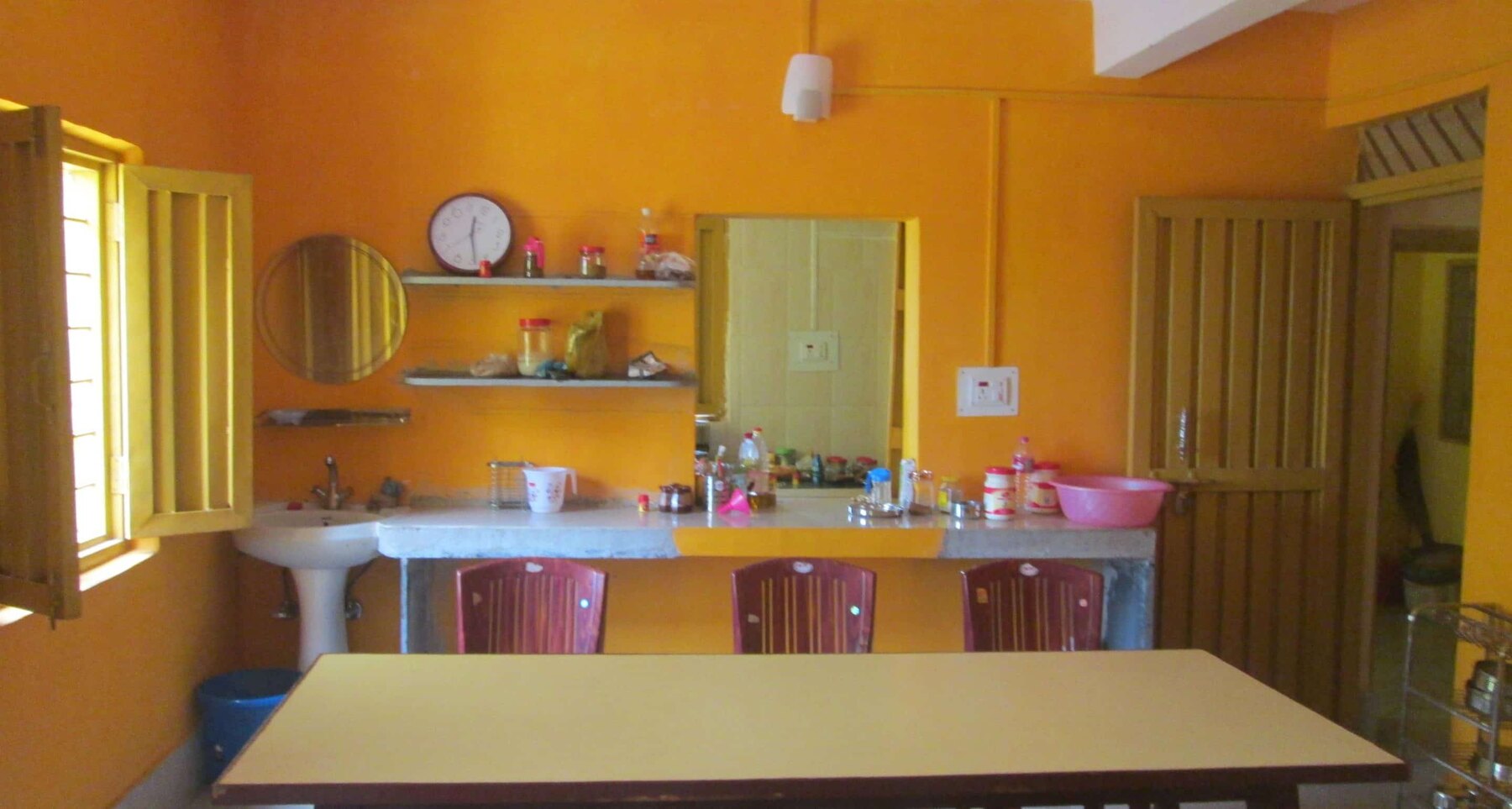 The simple dining room and meal-preparation area at the treatment centre